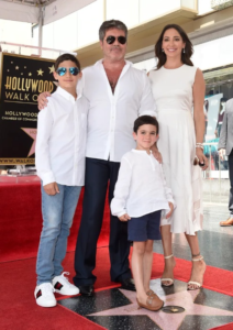 Simon Cowell, Lauren Silverman, Eric Cowell and Adam Silverman at the Hollywood Walk of Fame on August 22, 2018 in Hollywood, California | Source: Getty Images